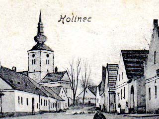 V pozad� budova �koly �p. 14, za n� st�echa �pit�lu-v��ez z pohlednice r. 1900